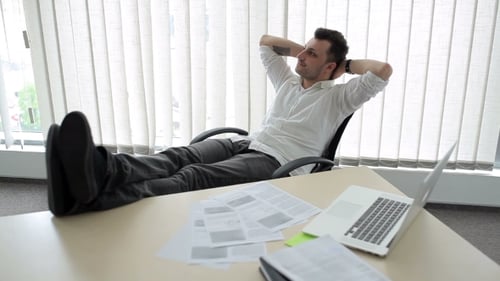 Young Man Dreams In The Office