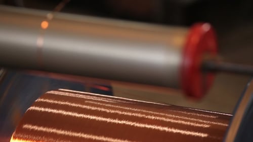 Wire Spooling Onto a Metal Reel in Factory