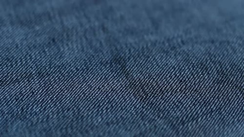 Denim Fabric Close Up Slow Panning Shot