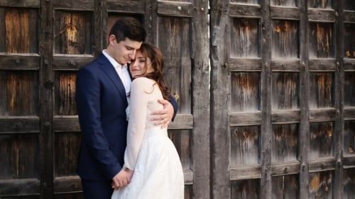 Bride On The Background Of The Gates Of The Castle