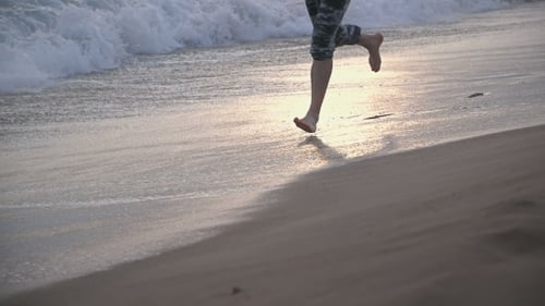 Man Running On The Beach
