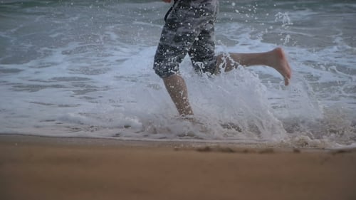 Man Running On The Beach
