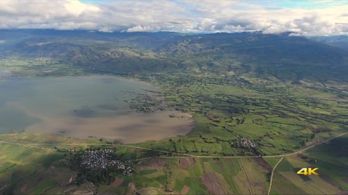 Aerial Plain Lake and Mountains