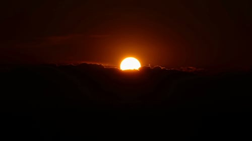 Sun Hiding in the Mountains at Sunset