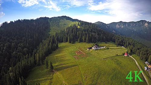 Aerial House in Mountains