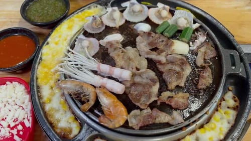 Set of korean grill buffet in the restaurant, pork and seafood