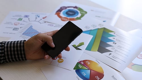 Businessman Working With Statistics