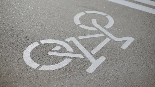 Bicycle Road Sign On Asphalt. Leisure Activities