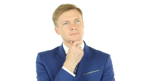 Man in Suit Thinking with Hand on Chin