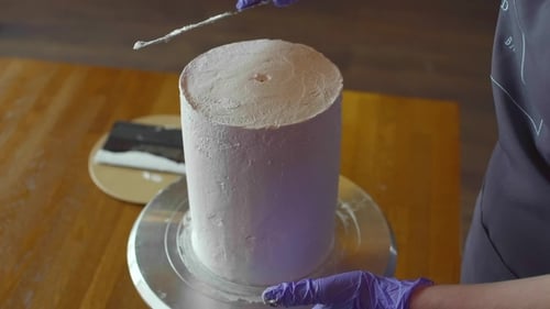 Cake Frosting Process on Rotating Stand, Close Up