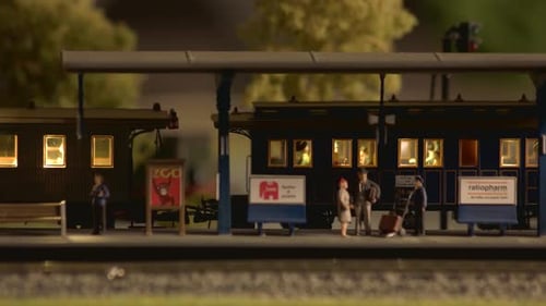 Miniature People at a Model Train Station