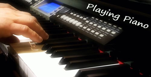 Hands Playing Electronic Piano