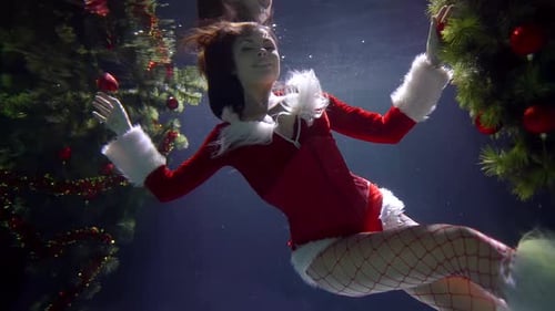 Underwater Santa Woman with Christmas Tree Ornament