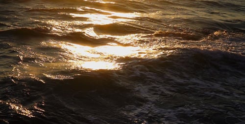 The Sea Waves in Sunrise