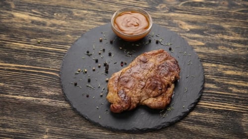 Grilled Steak with Sauce on Plate