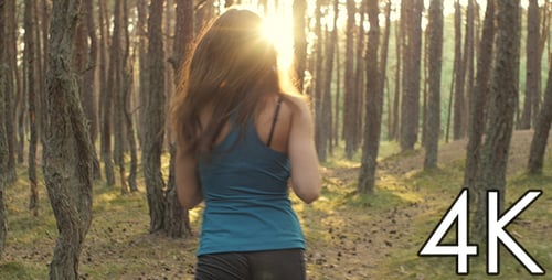 Girl Running in Woods