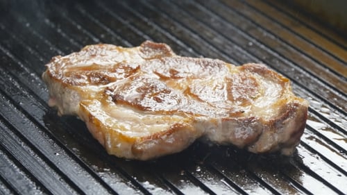 Pork Chop In a Frying Pan Grill