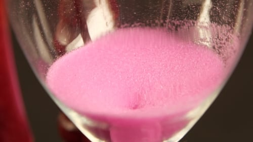 Sand Falls In Hourglass.