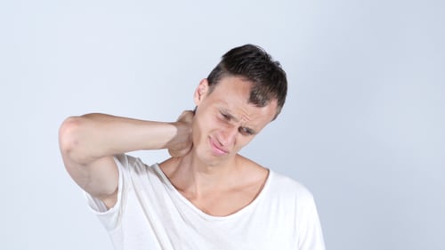 Young Adult Male Suffering Neck Pain