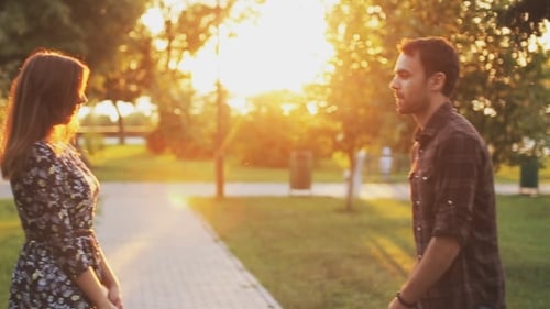 Young Couple Approach To Each Other And Kiss
