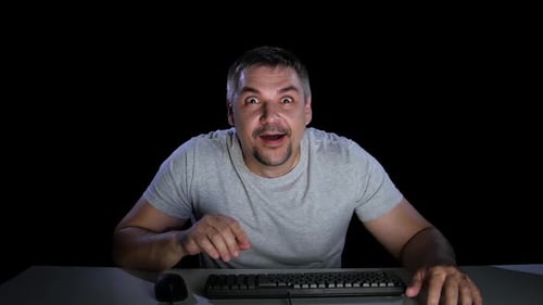 Man Happily Surprised By Viewing News Online. Emotions of Surprise