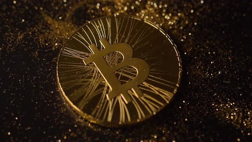 Gold Bitcoin with Glitter on Dark Surface