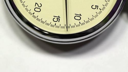 Vintage Stopwatch Counting Seconds in Close Up
