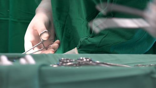 Surgical Team Prepares Tools for Operation