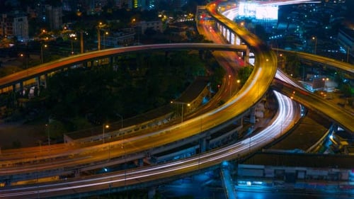 Aerial View of Highway Interchange at Night