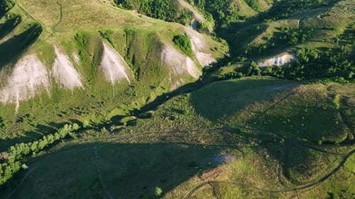 Drone View of Hills Fields and Chalk Mountains in Sunny Weather