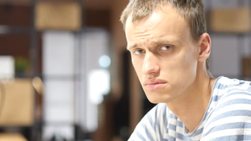 Portrait of Sad Man in Office