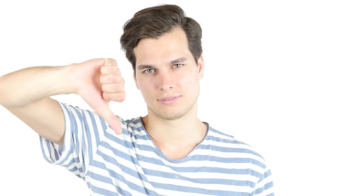 Young Adult Gestures Thumbs Up, Thumbs Down
