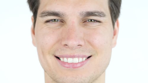 Smiling Man Close Up Portrait on White Background
