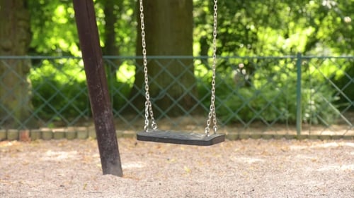 Swing Swaying In Park