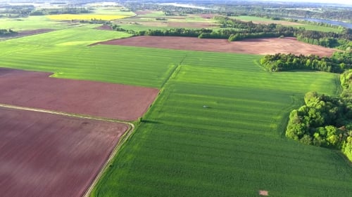 Aerial View of Green and Brown Agricultural Fields