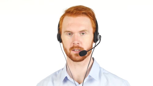 Talking with Customers, Call Center Operator with Red Hairs and Beard