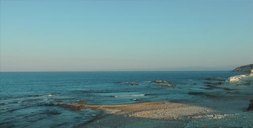 Beach Shore And Rocks