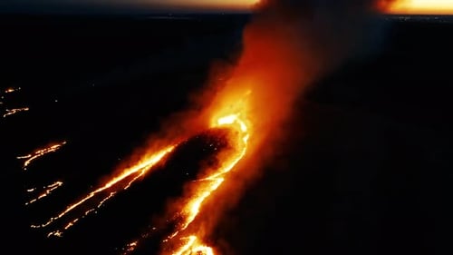 Dramatic Lava Flows at Night from Above