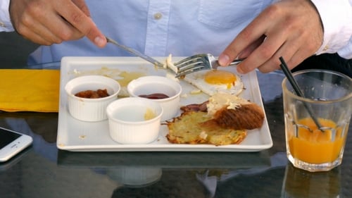 Breakfast Time With Eggs In Cafe