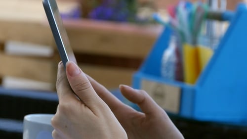 Hands Using Smartphone, Scrolling on Touchscreen, Close Up