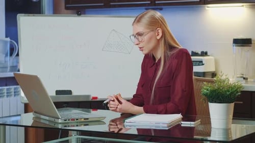 Woman Teaching Online Math Class at Home