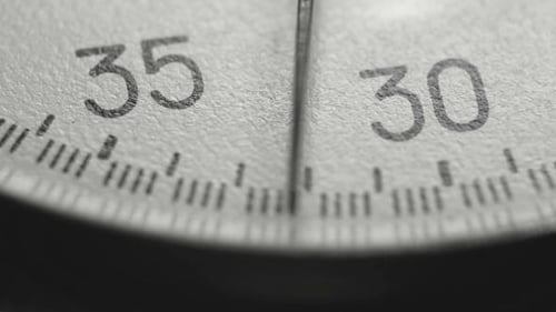 Clock Counting Down in Black and White