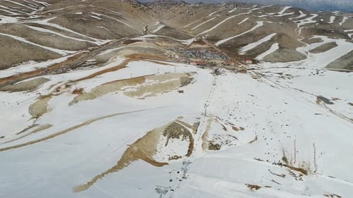 Snowy Mountains And Ski Center Aerial View