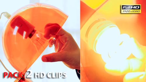 Nahaufnahme eines Handwechsels der Glühbirne in der Lampe — Packung mit 2 Video