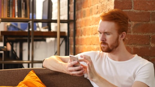 Surfing on Smartphone, Relaxing on Sofa