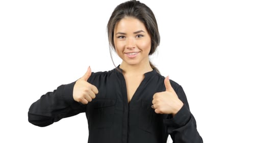 Thumbs Up by Beautiful Girl in Studio