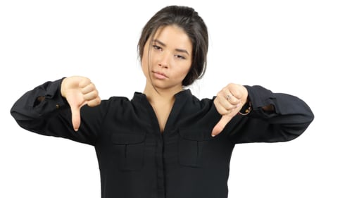 Woman Gives Double Thumbs Down Gesture