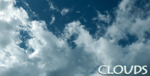 Clouds Float Gently Across Azure Blue Sky