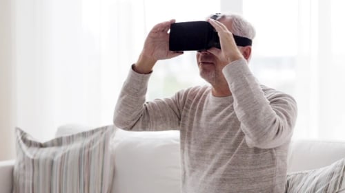 Man Wearing VR Headset Indoors