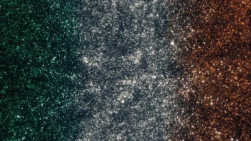 Shimmering Green White Orange Glitter Particles Background Loop